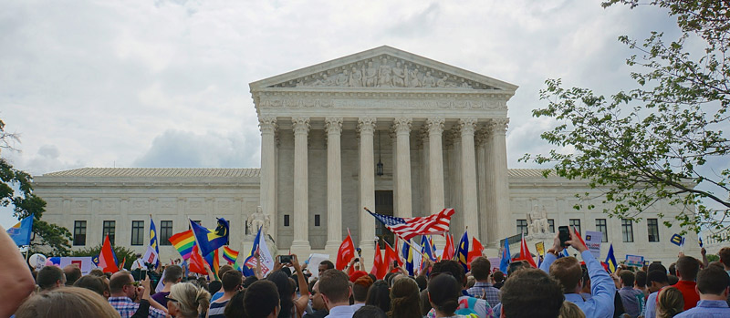 Crowd in front of United States Supreme Court in Washington, DC celebrating decision legalizing gay marriage in the United States