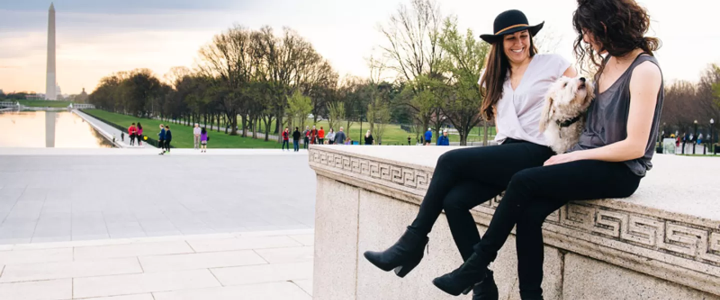 Couple by the Lincoln Memorial on the National Mall - LGBTQ-friendly things to see and do in Washington, DC