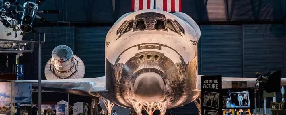 @abroadwife - Child standing in front of Space Shuttle Discovery at the Udvar-Hazy Air and Space Museum - Free Smithsonian museum near Washington, DC